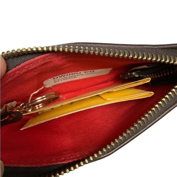 Dooney & Bourke Embossed Disney Aulani Wristlet NEW - Picture 5 of 15